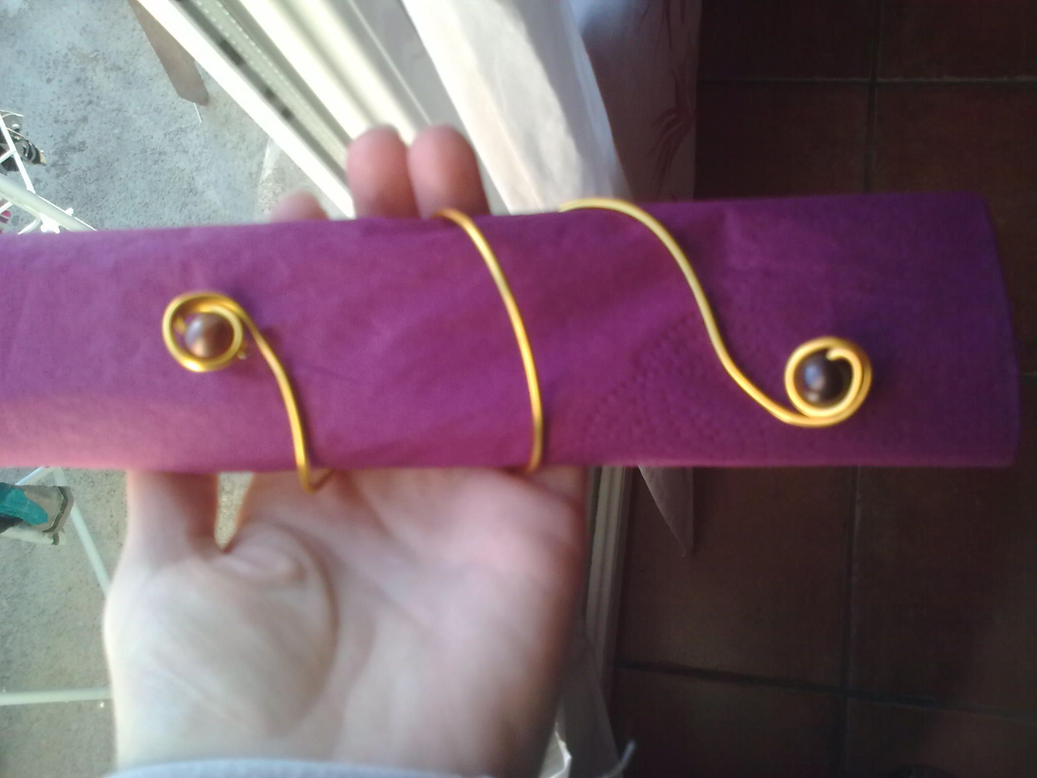 ronds de serviette doré avec perles